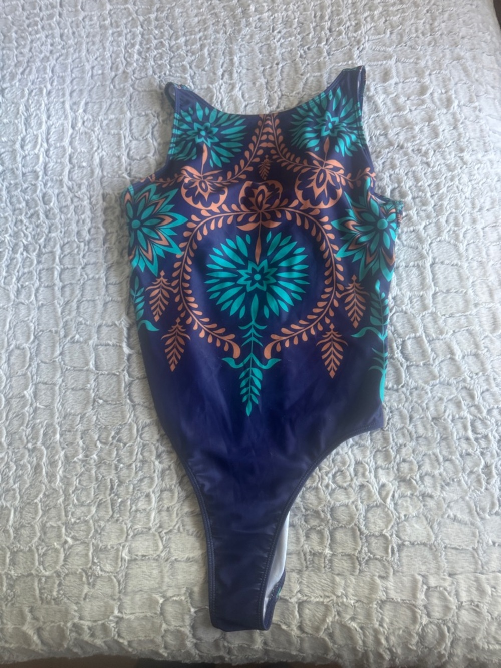 Woman’s one piece bohemian-style botanical print.